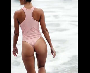 Beach woman in exposing bathing suit